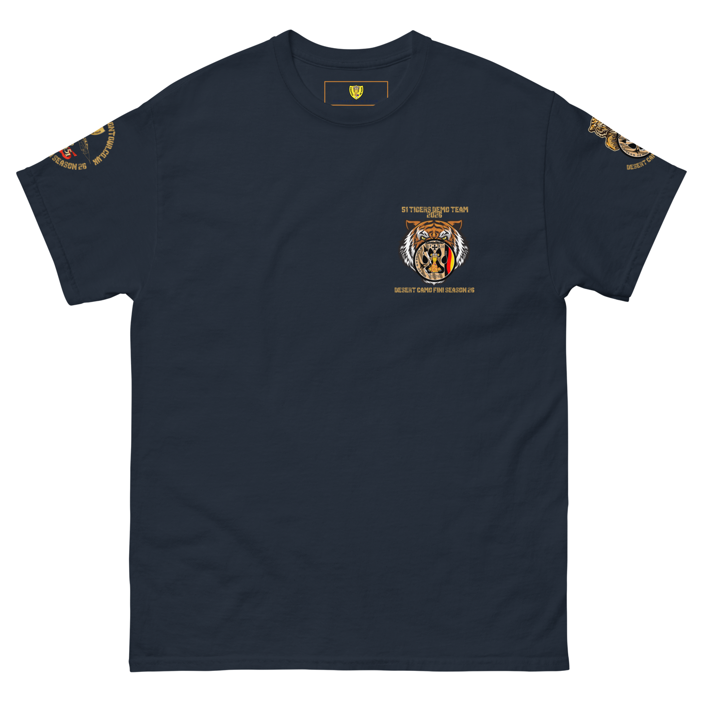 A navy short-sleeve crewneck t-shirt with a detailed 51 Desert patch tiger graphic on the left chest and gold military-style patches on both sleeves, displayed on a solid white background.